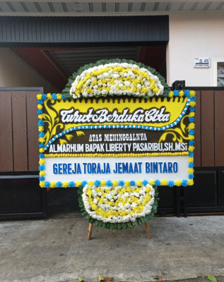 Papan Bunga Duka di Mpunda